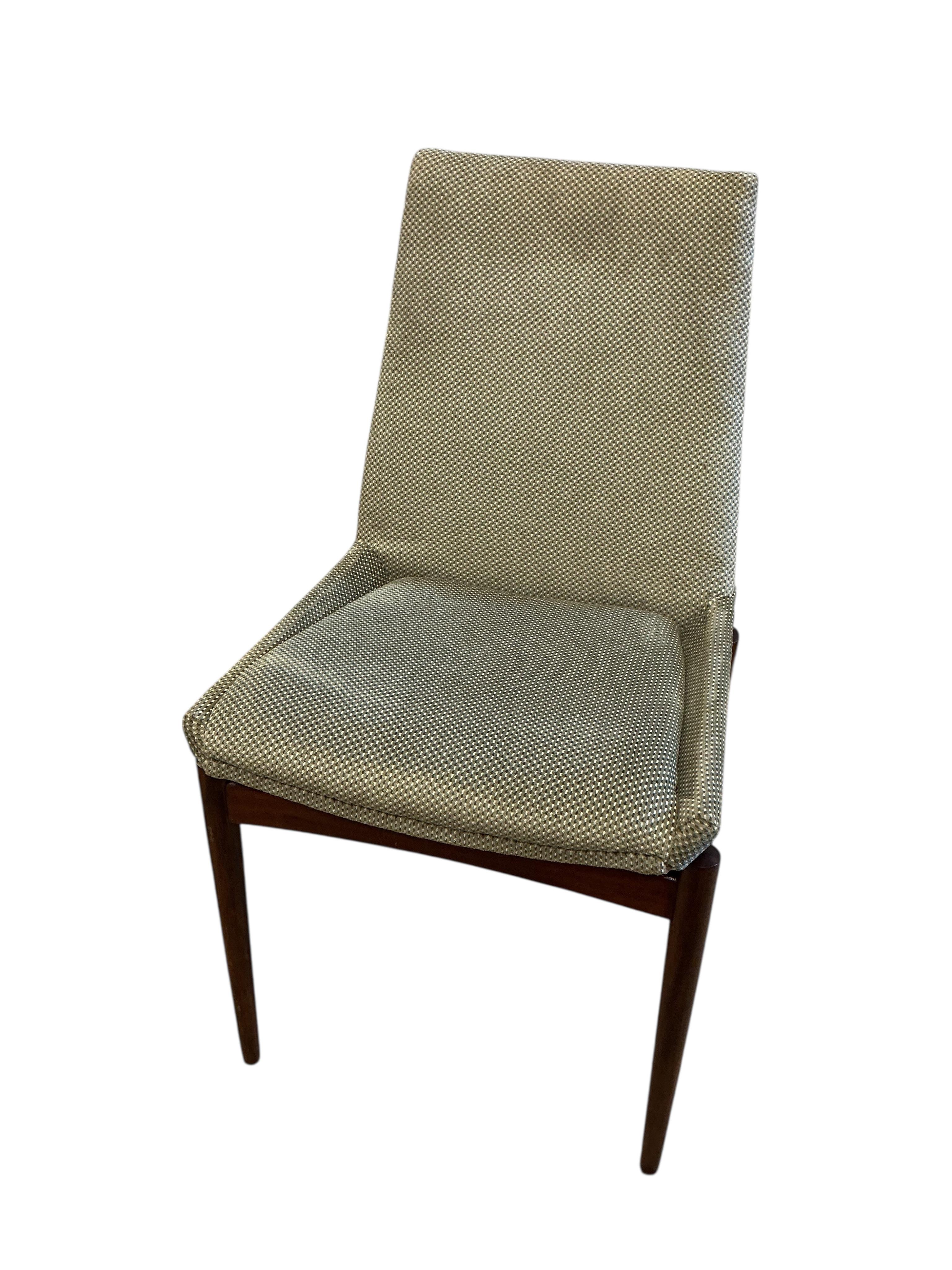 A mid century Archie Shine Indian rosewood extending dining table, width 144cm, depth 84cm, height 72cm and six upholstered chairs, two with arms